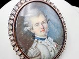 an image of a miniature portrait of a woman in a white dress