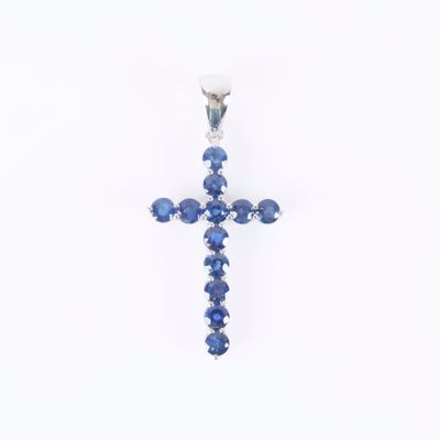 an image of a cross made out of blue sapphire stones