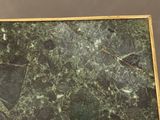 a picture of a picture of a picture of a green marble