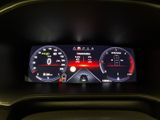 the dashboard of a car with a digital display showing the speed of the car