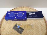 a pair of glasses and a pair of glasses on a table