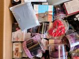 a box full of makeup and other items that are in it