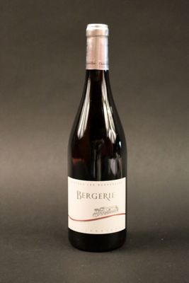 a bottle of wine that is sitting on a table