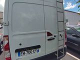 a white van parked on the side of the road