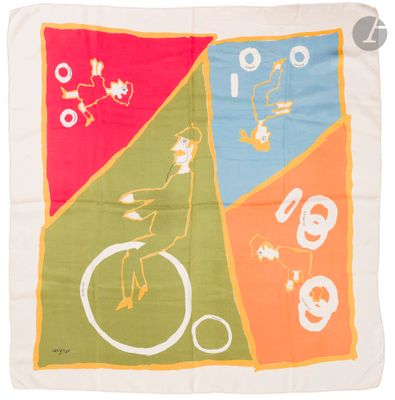 a close up of a colorful scarf with a bird on a bike