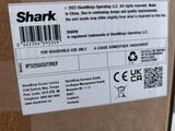 a box with a label on it that says shark