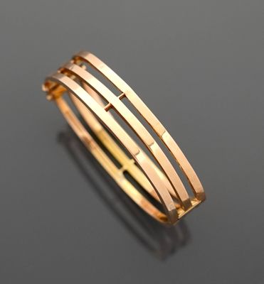 Bracelet jonc ouvrant, en or jaune 18K 750 millièmes, compos…