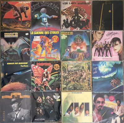 many different album covers on the wall of a room
