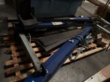 a lot of tools sitting on a pallet in a warehouse