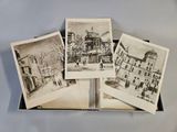 several old black and white photos of a city in a box
