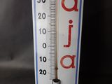 a thermometer with the word nola on it