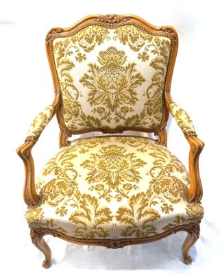 an image of a chair with a gold and white pattern on it