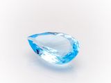 a blue topazte gems on a white background