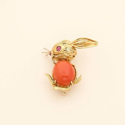 yellow gold plated rabbit brooch with coral stone eyes and ears