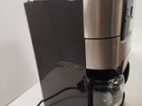 a coffee maker that is sitting on a table