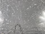 a close up of a piece of tin foil on a table