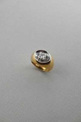 an image of a diamond ring on a white surface