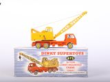 a toy truck with a crane on top of it
