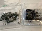 two bags of legos sitting on a table