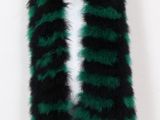 a mannequin mannequin wearing a green and black fur coat