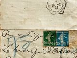 a piece of paper with writing on it that has a stamp on it