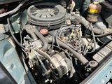 a car engine that is in the trunk of a car