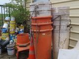 a lot of trash outside of a house with a lot of trash