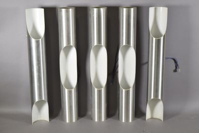 four silver tubes with holes and a blue handle on a white surface