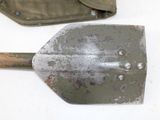 two shovels that are sitting next to each other