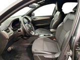 a picture of a car interior with the door open