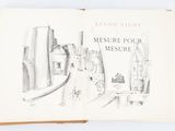 a book with a drawing of a city on it