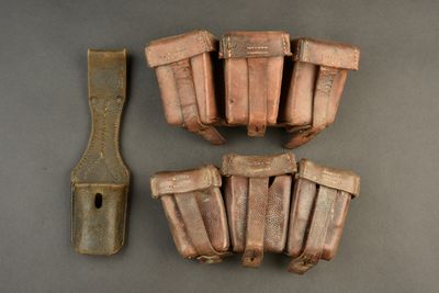 four old tools sitting on a table next to each other