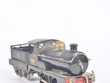 a toy train that is sitting on a white surface