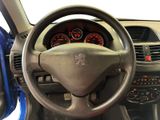 dashboard of a car with a steering wheel and dashboard gauges