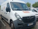a white van that is parked in a parking lot