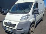 a white van that is parked in a parking lot