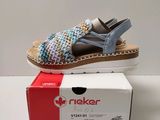 the box is empty and ready to be packed with a pair of women ' s sandals