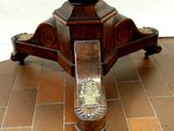 a wooden table with a clock on top of it
