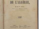 an open book with a black and white title on it