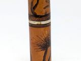 a tall vase with a painting of a tree on it