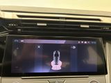 a picture of a car ' s dashboard with a digital display