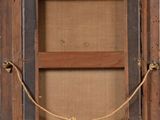 a picture of a wooden frame with a rope around it