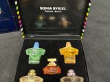 an image of a box of assorted perfumes on a table