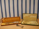two different types of tools in a case on a table
