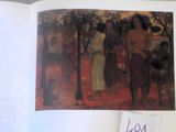 an open book with a picture of a group of people on it