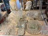 a lot of glassware on a table in a store