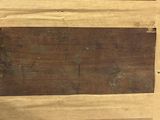 a picture of a piece of wood that has been cut in half