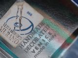 an image of a close up of a parking meter with a sticker on it