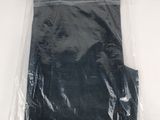 a plastic bag with a black shirt in it