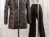jacket on a mannequin stand in front of a mannequin